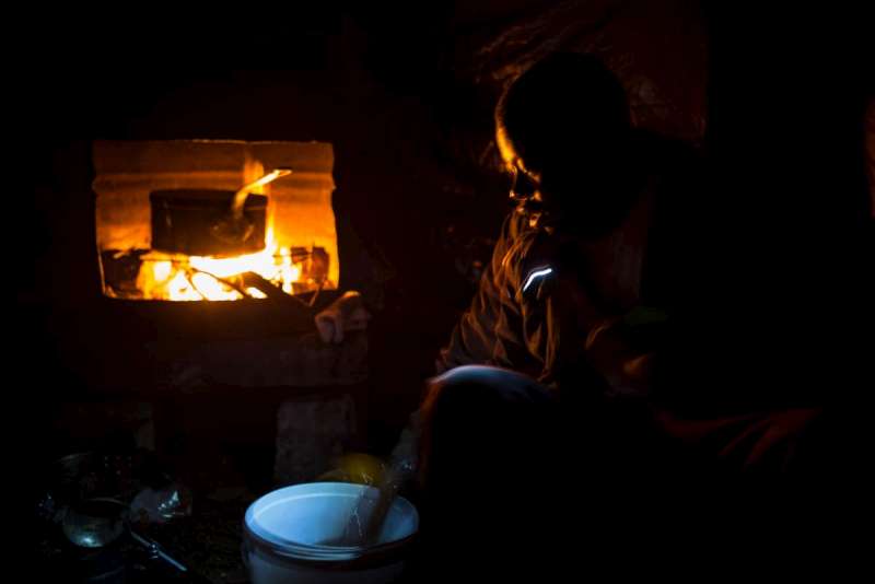 Yacine, a 22-year old asylum seeker from Sudan washes tea cups [&hellip;]