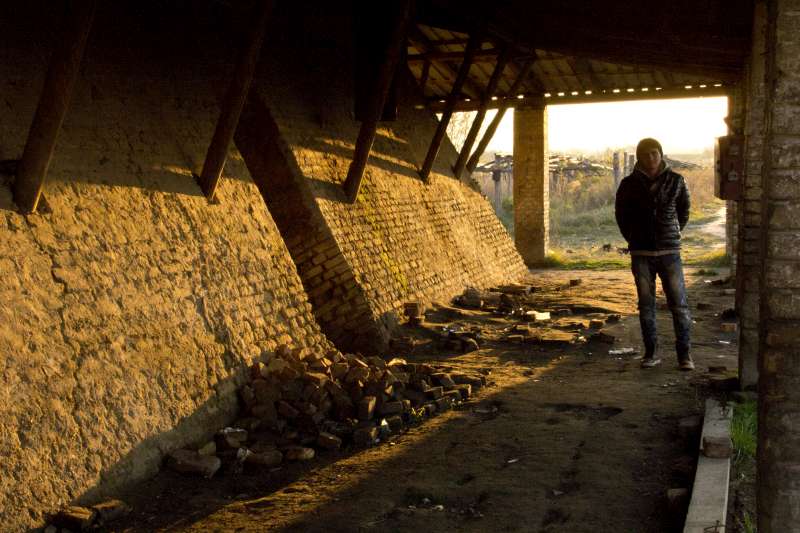 A young Afghan man waits in an abandoned brick factory in Subotica, [&hellip;]