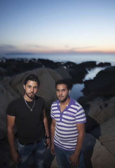 Syrian refugee brothers Thamer and Thayer stand by the shore [&hellip;]