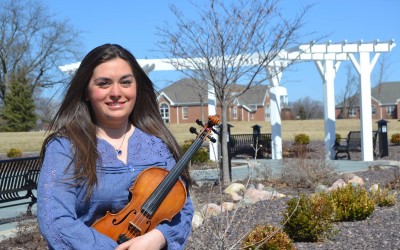 Mariela – Violinist. Sister. Student.