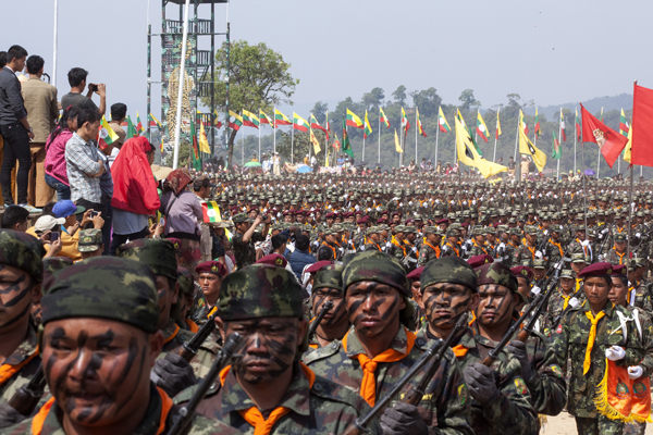 Shan State Army-South soldiers take part in a military parade at their headquarters in Loi Tai Leng in eastern Myanmar's Shan state, Feb. 7, 2015.