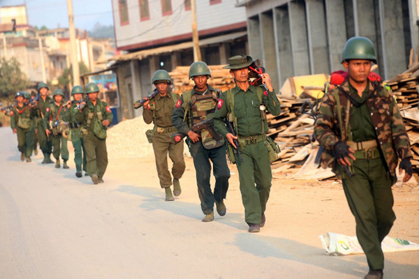Myanmar soldiers patrol Laukkai in the Kokang region of northern Myanmar's Shan state, Feb. 16, 2015.