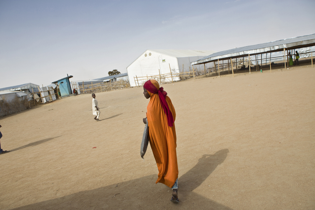 Fifteen-year-old Mariam is alone in a refugee camp in Cameroon. She remains traumatized after Boko Haram men murdered her father and abducted her mother, her sisters and brother. "I am from Madagali, in Adamawa State. I left because of Boko Haram. I saw several armed men walking towards my home one day of November 2014, early morning. I only had a few seconds to run and hide behind food bags in our stabble.  They abducted my mother and my five sisters and one brother. I could hear the screams of my mother and siblings. They did not find me.  They were wearing kaki T-shirts and had Kalashnikovs. They left with my family in several cars. Before coming to my home, Boko Haram had first gone to the school of the nearby village where my father was teaching, and they had killed him.  After the kidnapping, I could not sleep, I was afraid, I decided to go to northern Cameroon to be with my grand-mother and grand-father who live there.  Then I decided to go to a refugee camp as it was too crowded at my grand-parents’, we were ten in a small room. I keep thinking of my mother, my sisters and brother. I have no news of them since they were kidnapped".