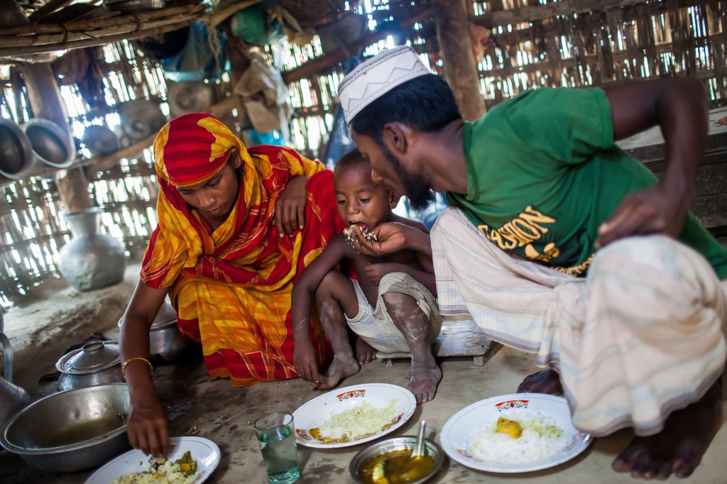 Yacoub and his family fled inter-communal violence in Myanmar’s Rakhine state in 2012 and came to Bangladesh, where they live in a local village in Teknaf, south-eastern Bangladesh. The 29-year-old unregistered Rohingya works in a local mosque and teaches the Koran to children, but cannot make enough money to feed his family of six. He hopes to sail to Malaysia to find work. His wife Shahina, 25, is worried but cannot stop him from making the dangerous journey. Photo by UNHCR/S.H. Omi/2014