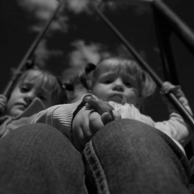 Two Syrian children on a makeshift swing in the Reception Centre, at the village of Pastrogor, May 7, 2014  Photo: Dobrin Kashavelov