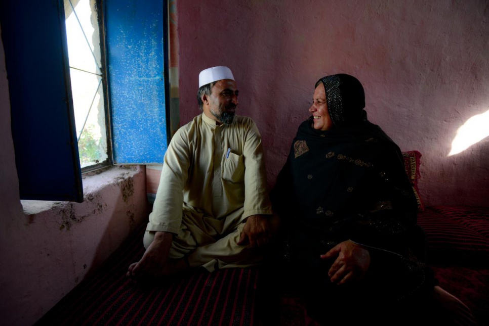 Asifi at home with her husband, Sher Muhammad. He has championed her work with refugees from the start: "In the future I would like [the schools] to go beyond 8th grade," he says.