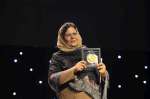 Afghan refugee and educator, Aqeela Asifi, accepts the Nansen Refugee Award in Geneva, Switzerland. 