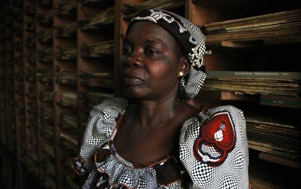 Julie Ewango, 57, produces radio shows on reconciliation, tolerance and forgiveness for the conflict that pushed her and her family to displacement. Photo: UNHCR/ A. Kitidi/2014.