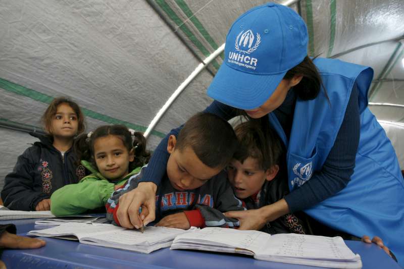 Syrian refugees/Turkey

A UNHC staff member assists a young Syrian refugee with his classwork in Adiyaman Refugee Camp, Gaziantep Province, Turkey on December 5th, 2012. More than 2000 Syrian children are attending primary school in Adiyaman camp*.