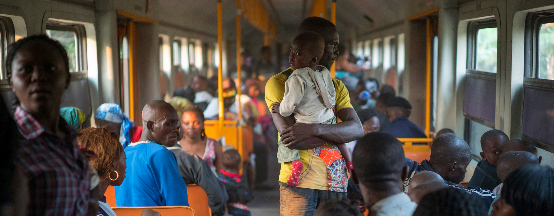 Angolan refugees, some of whom had been living in exile in the Democratic Republic of Congo for up to 40 years, journey back to their homeland by train from Kinshasa.