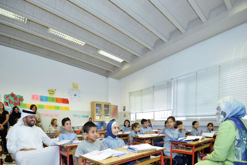 Syrian refugee children pay attention during a visit to their Beirut classroom by the royal visitor from Sharjah. 