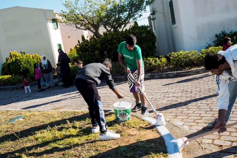 Refugees spruce up some of the public spaces in LM Village.