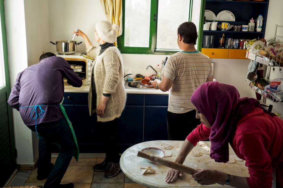 Tarek and Kindra prepare dinner with Mohammed and his wife, Marua.