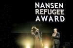 UNHCR High Commissioner António Guterres presents the Nansen Medal to Aqeela Asifi at the Nansen Refugee Award ceremony.