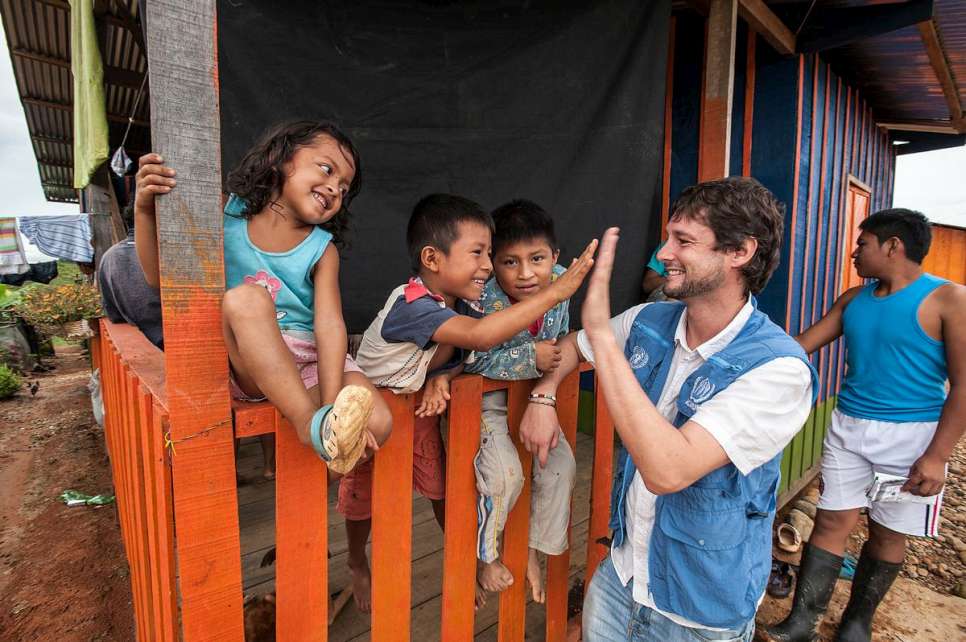 Children at Chami Puru, a new community settlement for 35 indigenous families in Caqueta, Colombia. The families were forced from their homes in 2005 by armed guerillas threatening forced recruitment of the young men. UNHCR and local partners have helped to establish the settlement and further develop livelihood opprtunities with craft work.