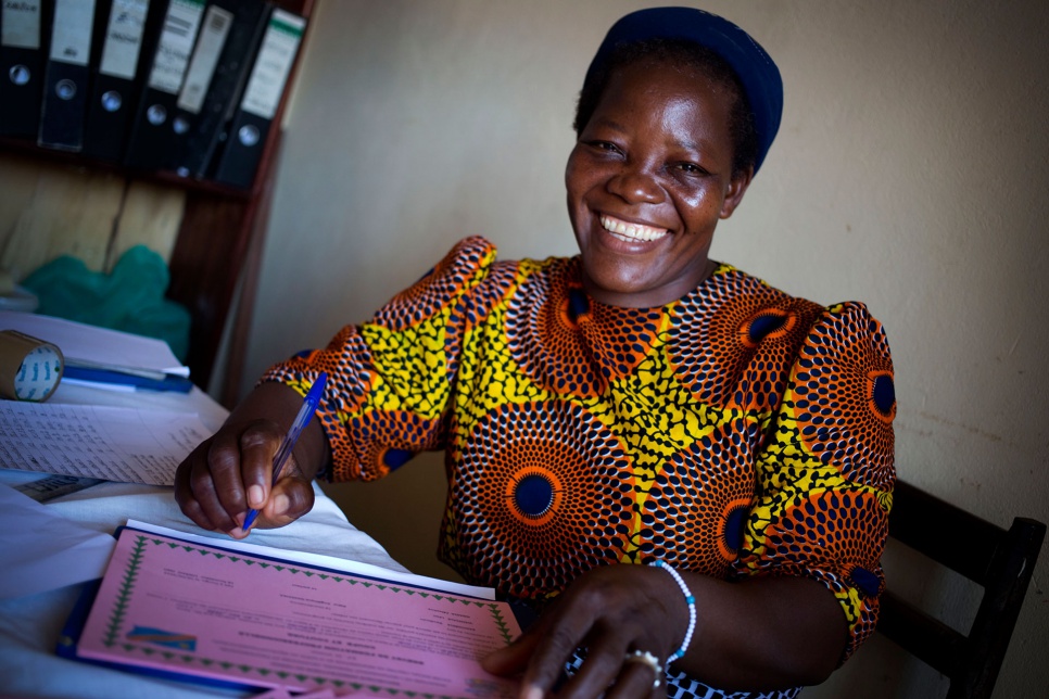 Sister Angélique does some paperwork in the office of the newly opened bakery.