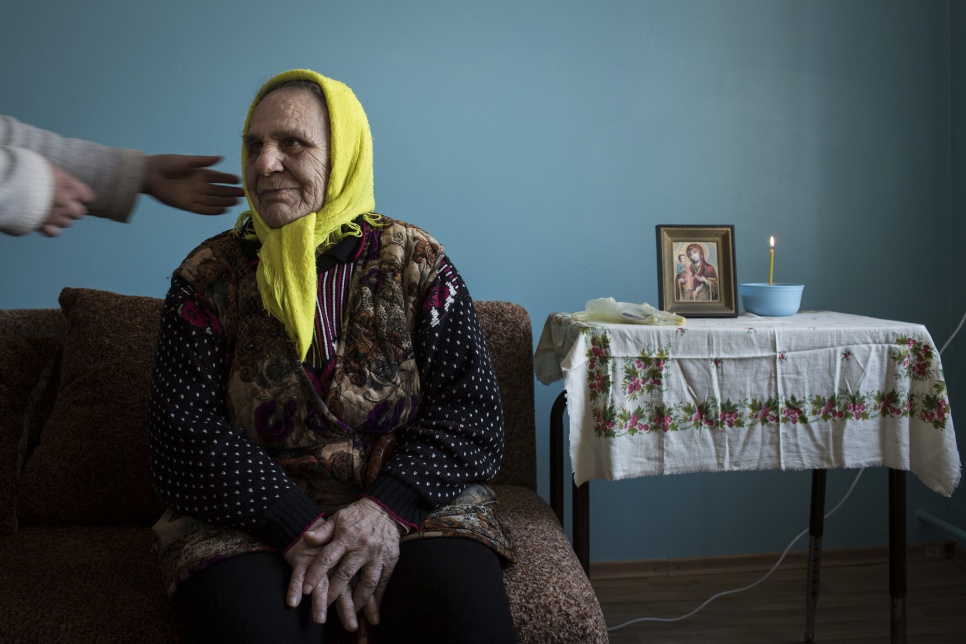  Maria Sakha, 73, lives in a local community centre that serves as a home for the elderly in Myrne, Ukraine. Maria is blind. She sought safety there in September 2014 after her house was destroyed by a bomb. "It is a life of boom boom boom," she says. "It is intolerable. We are shaken all night. Everybody is afraid."