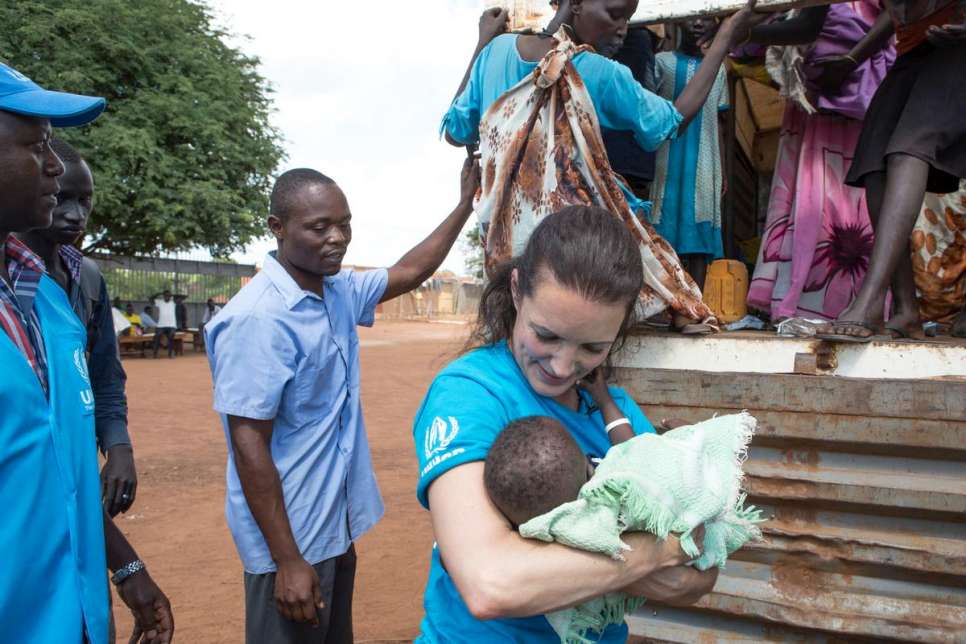 Kristin welcomes new arrivals into the Adjumani Transit Centre. 87 per cent of the South Sudanese are women and children.