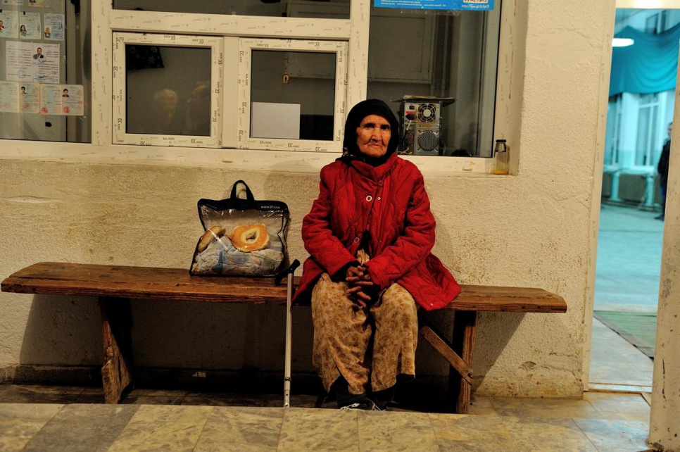 Beghum, 80, from Afghanistan, waits to be reunited with her family. She was travelling with family members but lost them lost in the crowd.