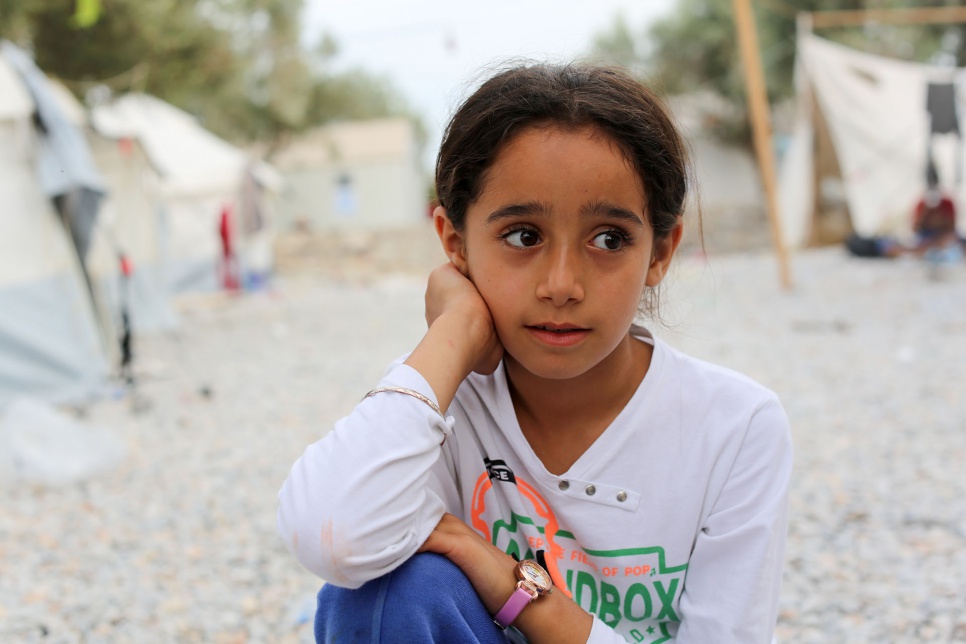 <strong>Lesvos, Greece</strong><br><br>The extent to which refugee children have been conditioned by their environment is heartbreaking. We wanted permission to take this young girl's photograph, so we asked if her mother was nearby. Her eyes filled with the most uncontrollable fear that I've ever seen in a child. 'Why do you want my mother' she asked. Later, her parents told us how the family had crouched in the woods while soldiers ransacked their house in Syria. More recently they'd been chased through the woods by police. After we'd spent a few minutes talking with her parents, she returned to being a child and could not stop hugging us, and laughing, and saying 'I love you so much.' But I went to sleep that night remembering the terror on her face when we first asked to speak to her mother.