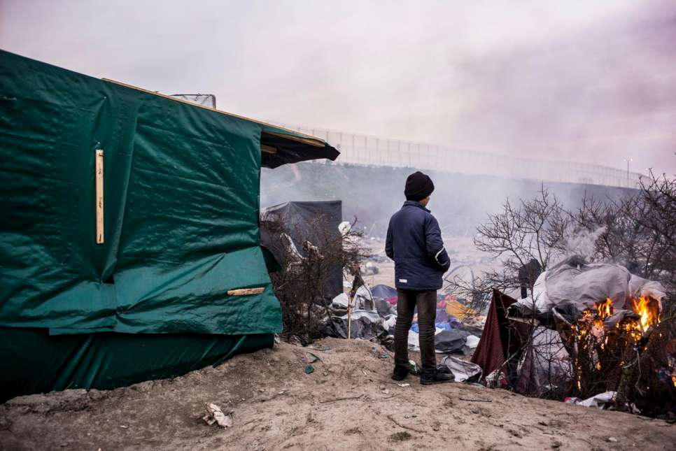 This young boy is amoung some 4,000 refugees and migrants living in the harsh conditions in the makeshift camp known as "the Jungle" in Calais.
