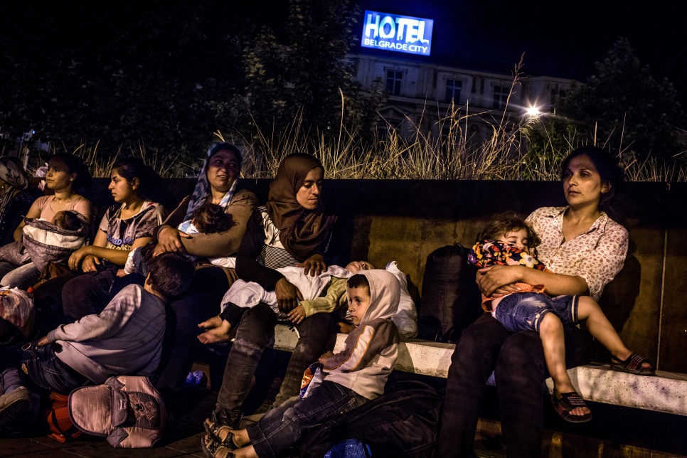 A group of Kurdish refugee mothers arrive in Belgrade, Serbia, and pause for a moment to find their bearings. They are among hundreds of vulnerable refugees who passed through the Balkans every day during the summer of 2015 to find safety in Europe.