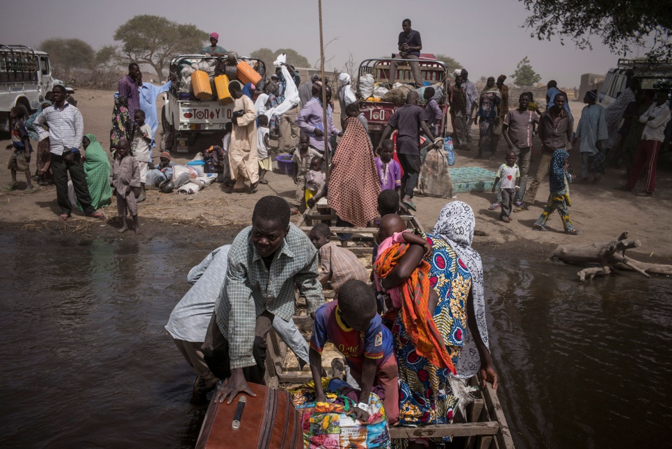 Nigerian refugees move from Ngouboua, their initial place of refuge on the shores of Lake Chad, to the Dar-es-Salam settlement, near Baga Sola, Chad.