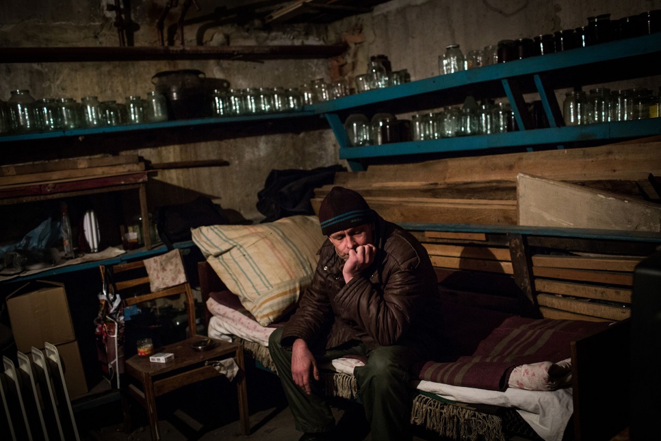 Nikolai sits in the basement of his apartment block in the Kievsky district of Donetsk, Ukraine, 10 weeks after his mother's death. "It happened because of the stress."
