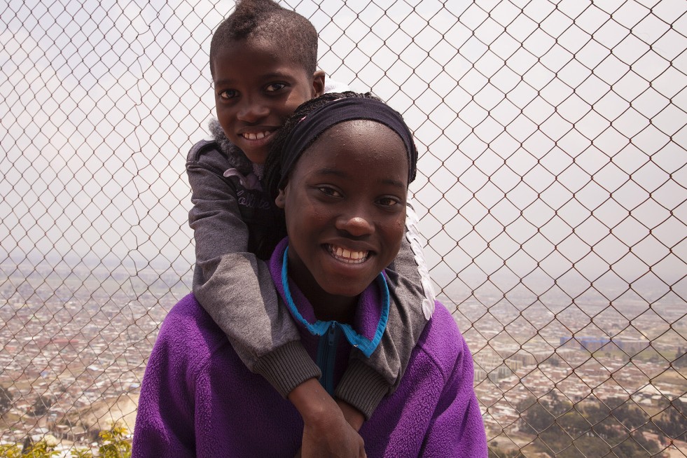 "My friends call me Ronaldo, because I am so good at football!" Oscar, with his sister. 