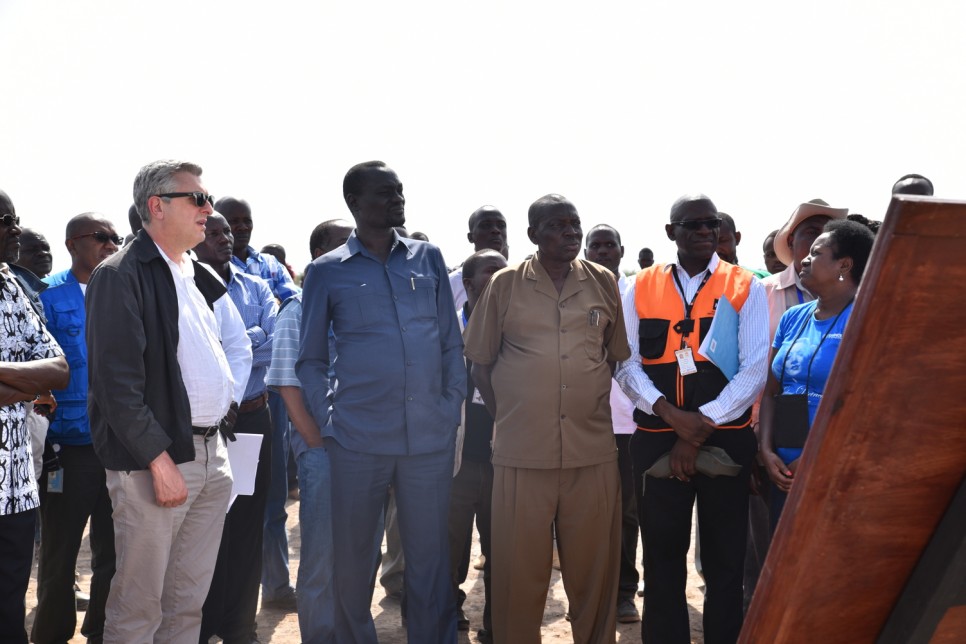 Mr. Filippo Grandi, Turkana County Governor Hon. Josphat Nanok and a member of the host community at Kalobeyei 