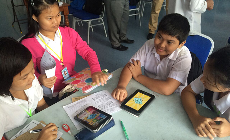 Students at Kachin Refugee Learning Center test the tablets as a way to increase their access to education material.