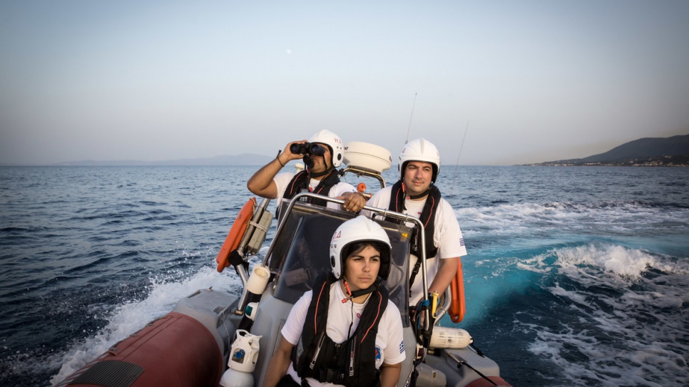 HRT volunteers Panagiotis (left) and Antigoni (centre) conduct a training exercise with Konstantinos (right).