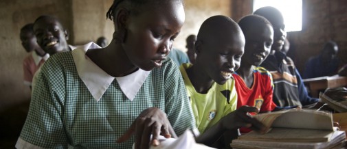 Children read from their textbooks, in a classroom of Shamba Primary School, in the Kakuma refugee camp, in the north-western Turkana District.