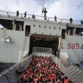 Italy, Mediterranean Sea. During one rescue operation, 186 people – from Nigeria, Pakistan, Nepal, Ethiopia, Sudan, Malaysia and Syria – are transferred from the Grecale to the San Giusto.  (c) UNHCR / A. D'Amato / March 2014.
