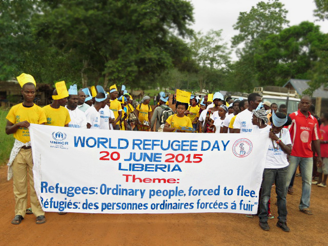 Refugee parade: young women and men on their way to mobilize all the refugees of PTP camp to celebrate World Refugee Day last week end. UNHCR / Emmanuel Uwurukundo