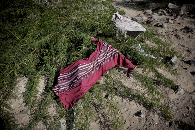 Clothes belonging to migrants and refugees dry in the sun. 