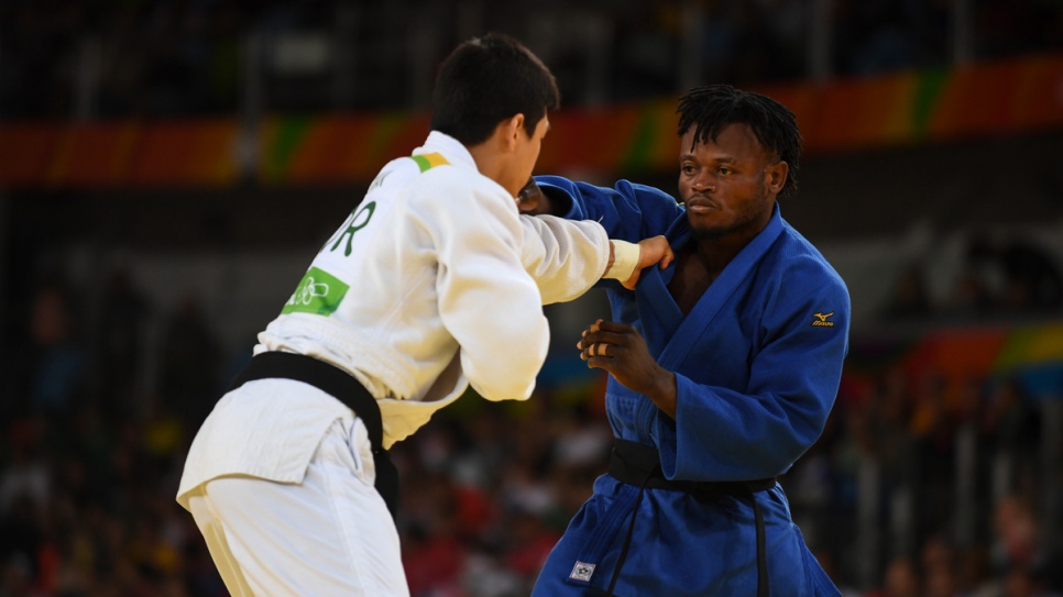 Popole takes on Donghan Gwak, a former world champion from the Republic of Korea, during his second match at the Rio Olympics.