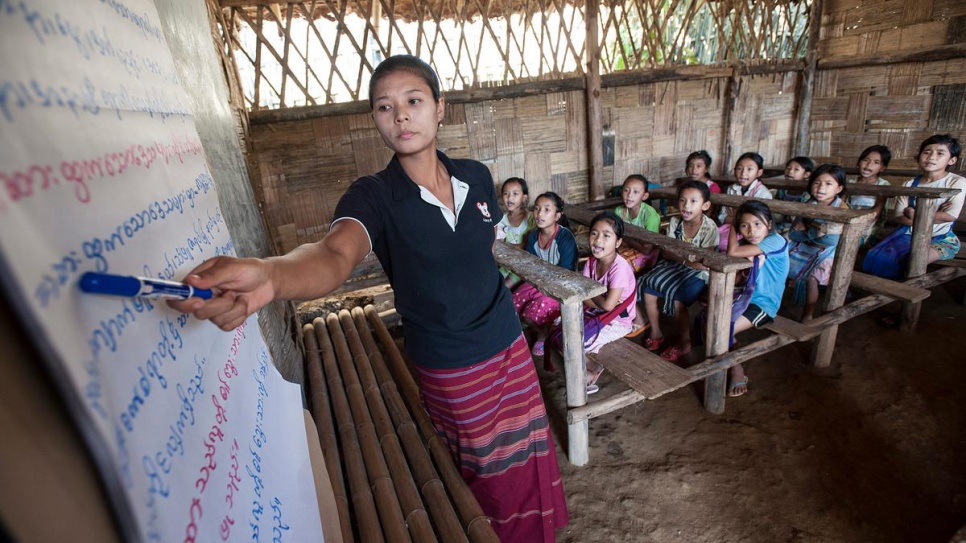 Sumeh, 26, is teaching Burmese to her Standard 2 class of Karenni refugee children. Sumeh, also a Karenni refugee, says the best thing about living at the Ban Mai Nai Soi camp in northern Thailand is free access to education for all children.