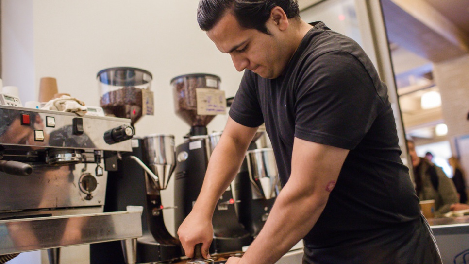 Samiullah puts to use the skills he recently learned during a barista training programme in Oakland, California.