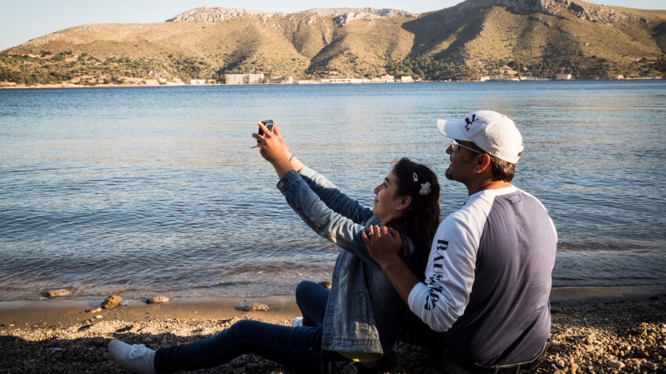 Ensaf and her father, Bashar, take a selfie to send to her mother and brother in Germany.

