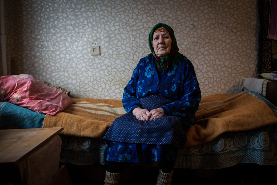 Alexandra Leonova, 91, found temporary accommodation at a collective shelter in Shakhtarsk, Ukraine. She fled her home in Nikishino in September, when it was destroyed in the fighting. She has not received her pension in seven months and needs medicine.