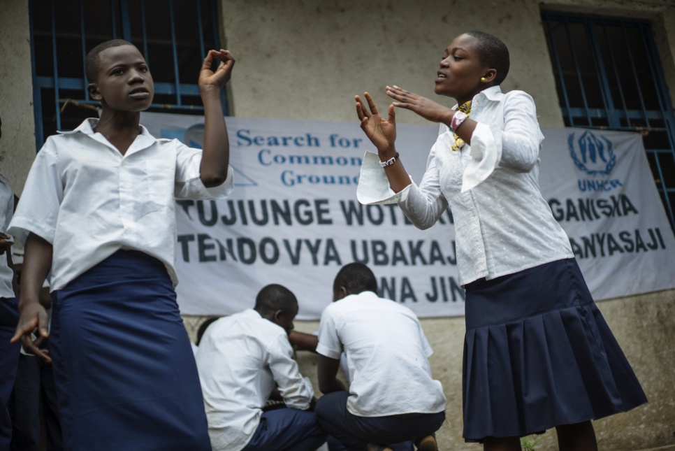 Young actors with UNHCR partner Search For Common Ground put on a theatrical presentation at a school in Masisi, Democratic Republic of the Congo.