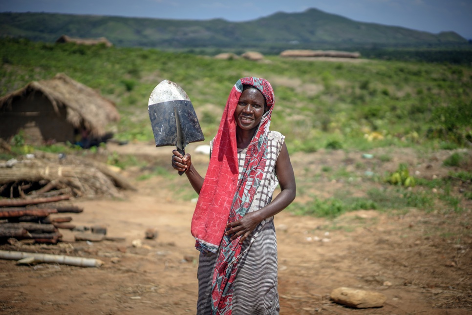 Step 6: Provide the Tools People Need. Generose Musikana, 40, holds a new shovel head. She returned home to South Kivu after seven years as a refugee in Zambia, only to flee again.