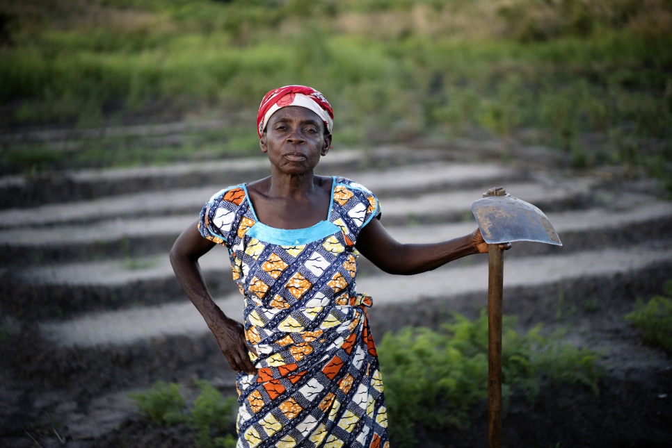 Step 3: Make Sure People Have Access to Land. Machozi Lubenga, 67, works a plot of land to grow food in Lukwangulo, DRC.