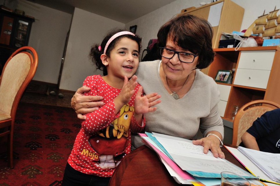 Six-year-old Thuraya with Waltraud Hamm, a retired local teacher and one of a network of volunteers helping Syrians adjust to life in Gäsnerdorf.