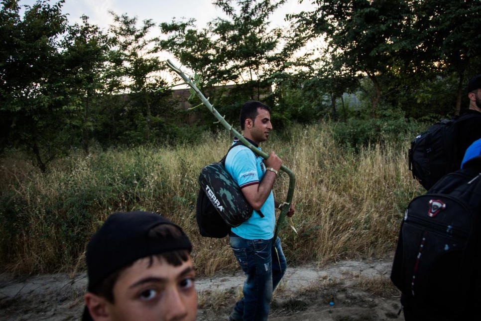 Fearing attacks from criminal gangs, who prey on refugees with little access to police resources, Syrians carry makeshift weapons when crossing the border from Greece.