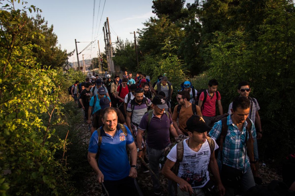 Wary of criminal gangs, Syrian refugees sometimes travel in groups of 100 or more when crossing borders in the Balkans.