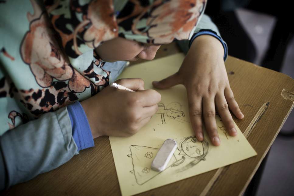 Zainab, 15, at one of the drawing classes run by Omaima. 