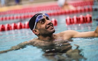 Greece. Syrian refugee carries the Olympic flame in Athens