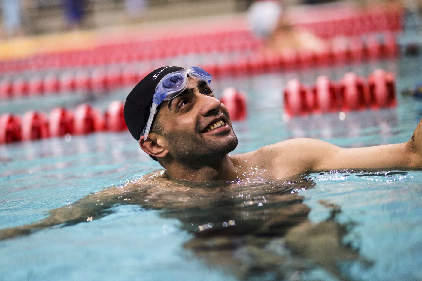 Greece. Syrian refugee carries the Olympic flame in Athens